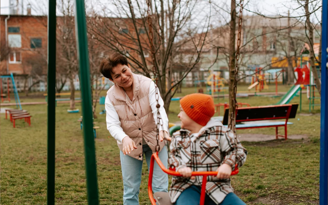 Parent guiding a child calmly in a public setting, applying ABA techniques to manage behavior outside the home