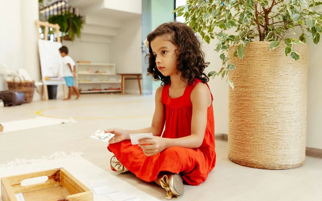 Therapist teaching child through play during ABA therapy session